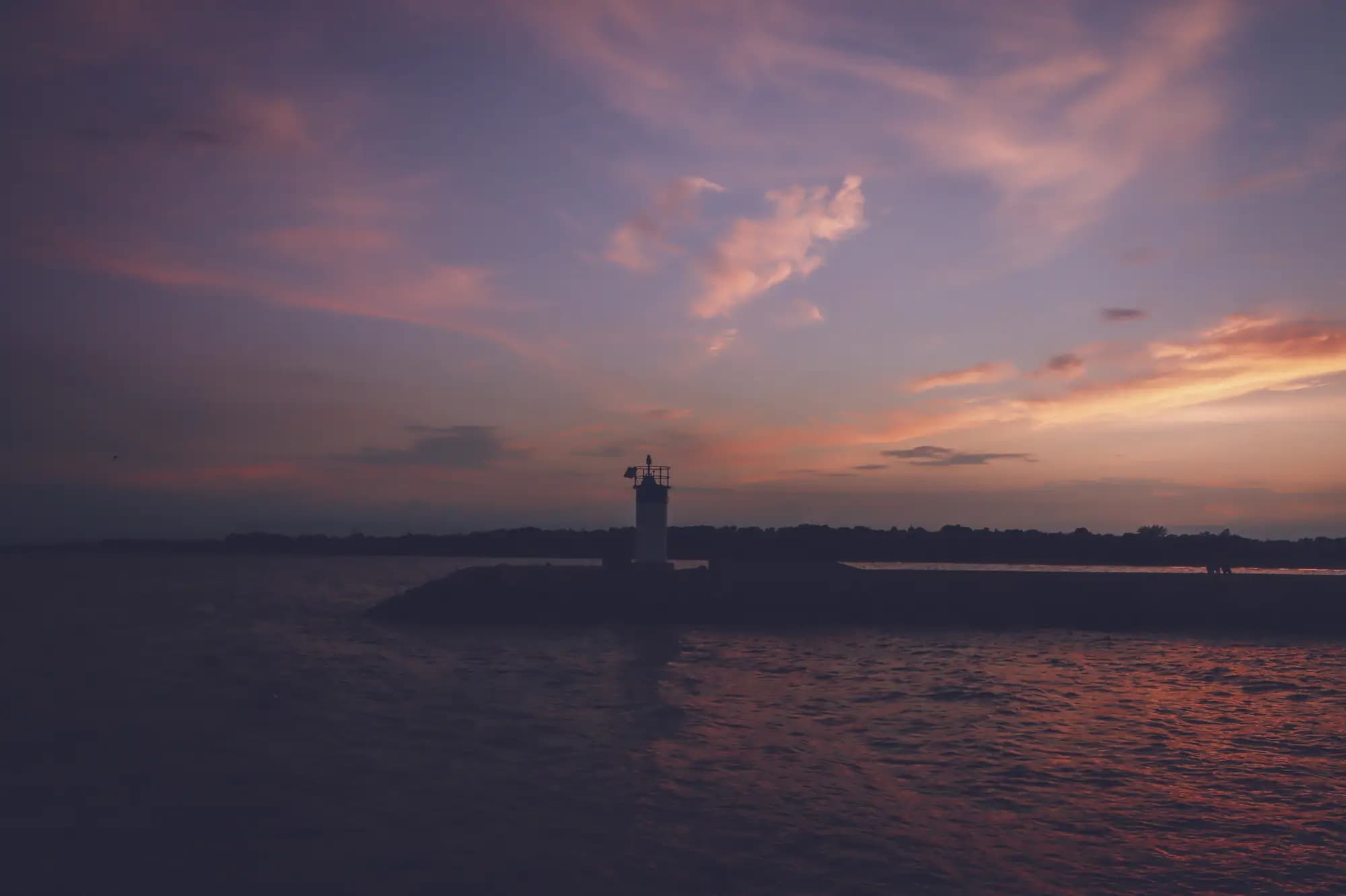 A lighthouse on Lake Ontario at dusk in Ajax, Ontario